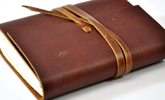 2 hand sewn leather notebook