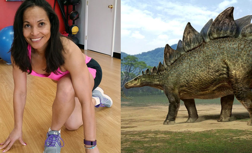 A woman exercising and a stegosaurus