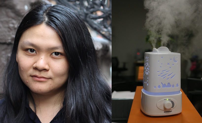 woman next to humidifier