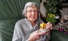 grandma eating cake old woman